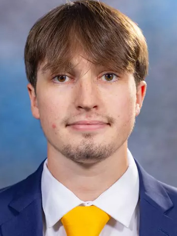 Carson Reed headshot